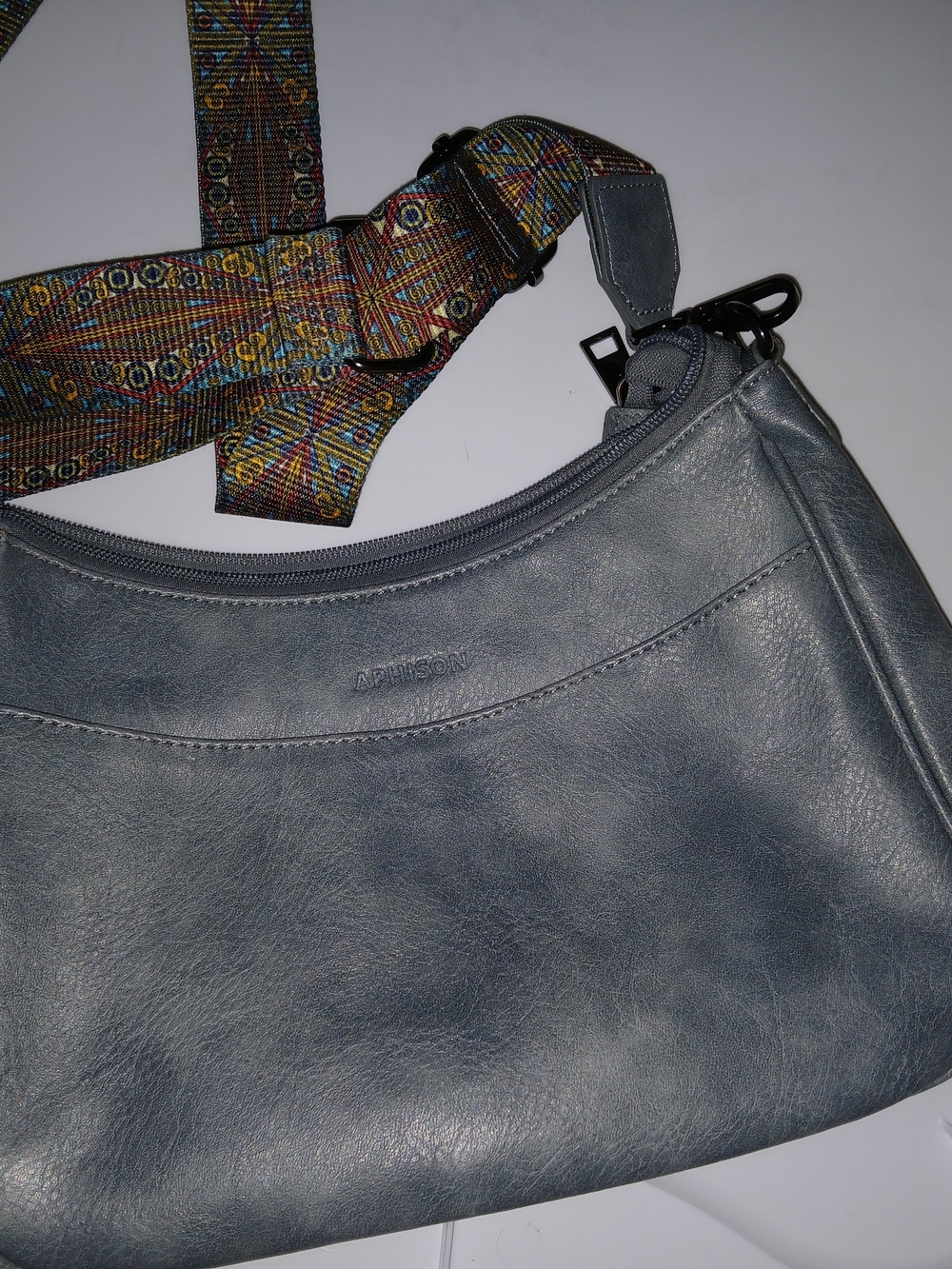 Light Blue Crossbody Bag with Patterned Strap